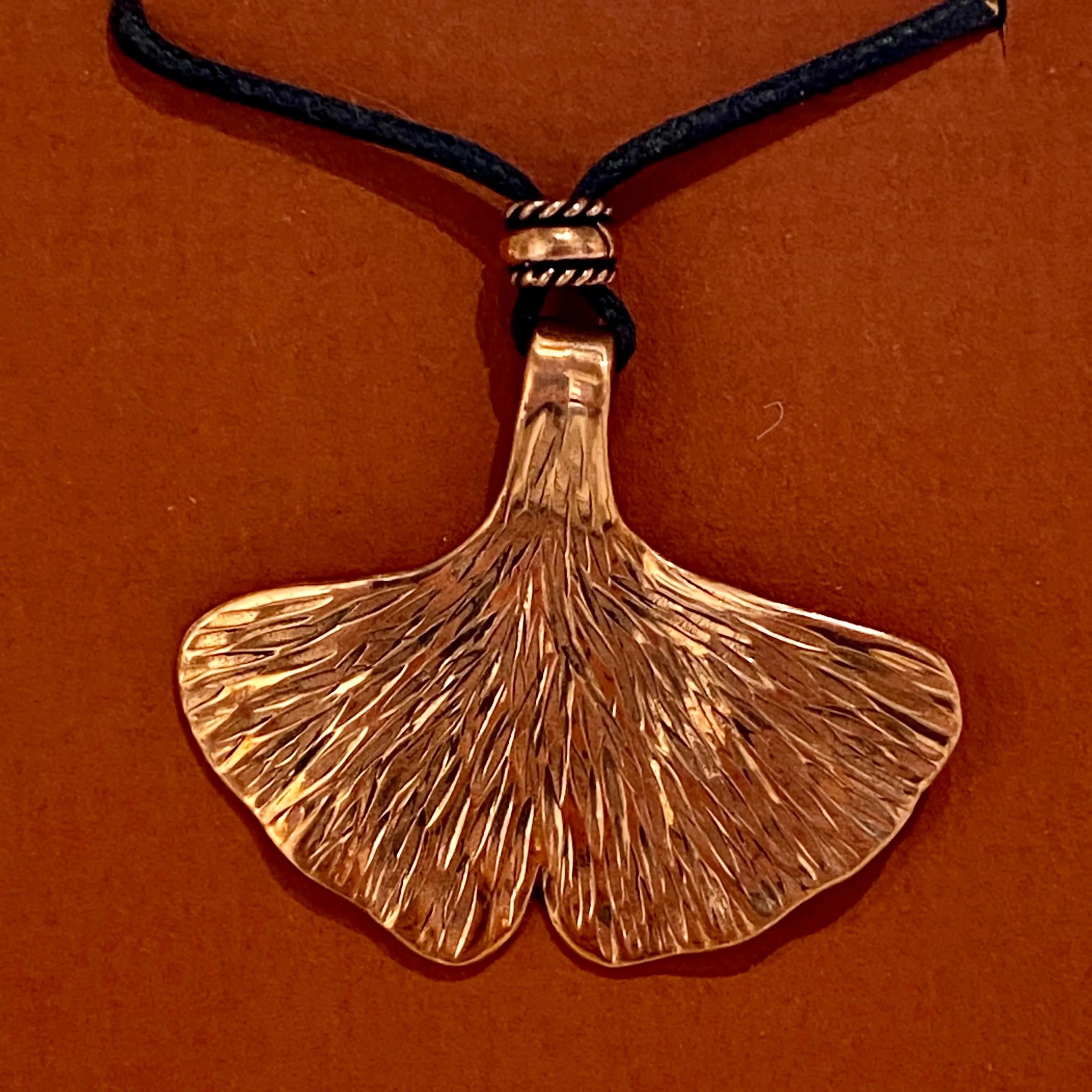 Copper and Silver Pendant Necklaces by Adam Bateman